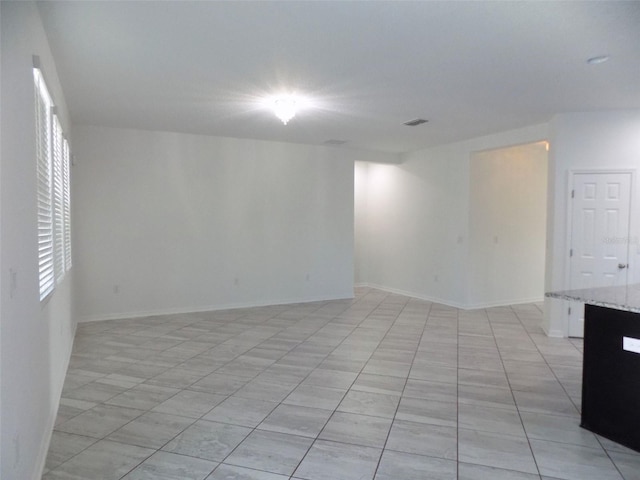 view of tiled spare room