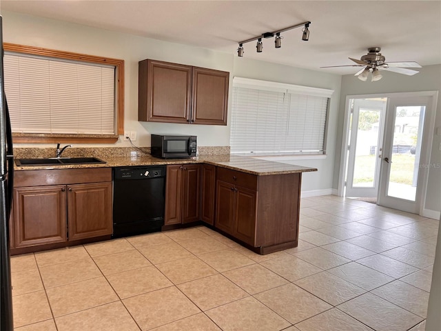 kitchen featuring black appliances, kitchen peninsula, ceiling fan, sink, and light tile patterned flooring