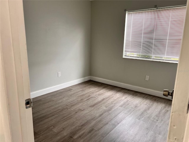 unfurnished room featuring light wood-type flooring