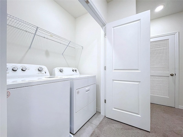 laundry area featuring independent washer and dryer