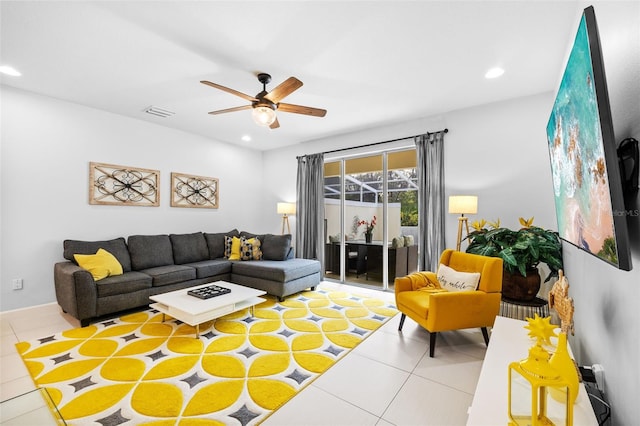 tiled living room with ceiling fan