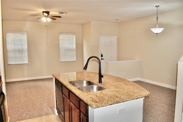 kitchen with ceiling fan, black dishwasher, light colored carpet, pendant lighting, and sink