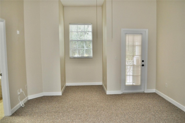 view of carpeted spare room