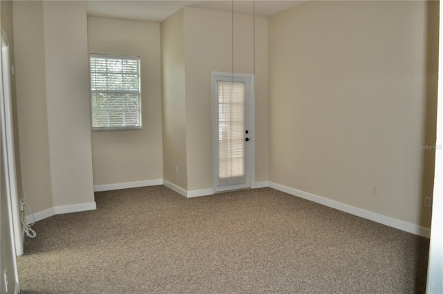 empty room with carpet floors