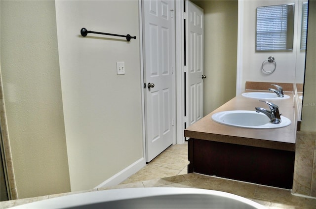 bathroom with vanity and tile patterned floors