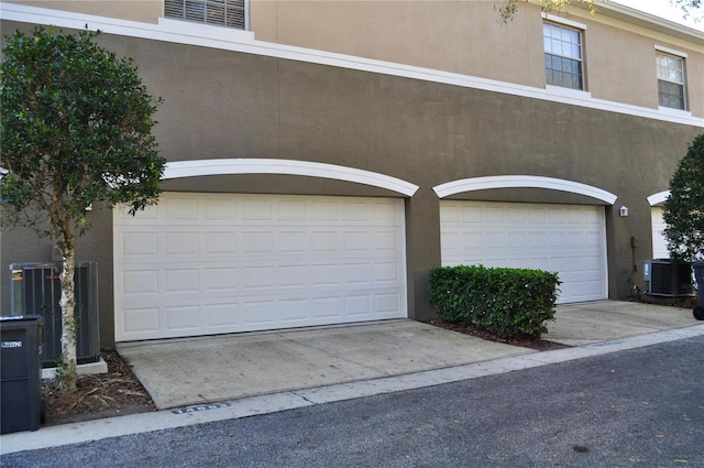 garage with central AC unit