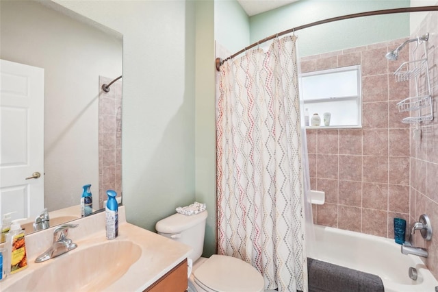 full bathroom with toilet, vanity, and shower / tub combo