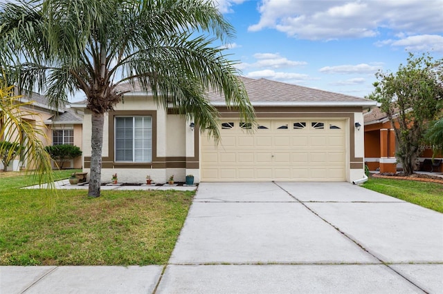 ranch-style house with a garage and a front lawn