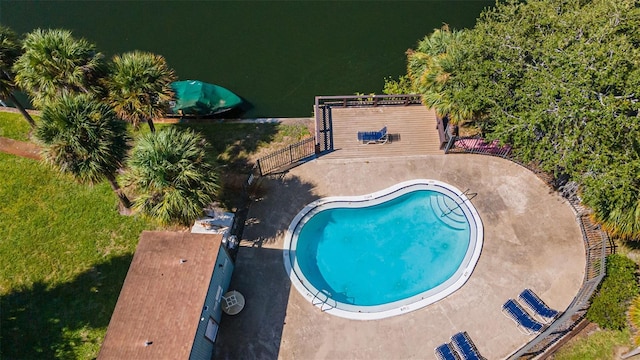 view of swimming pool with a patio area