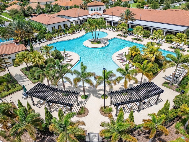 view of swimming pool featuring a pergola