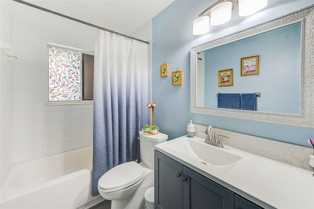 full bathroom featuring vanity, toilet, and shower / tub combo