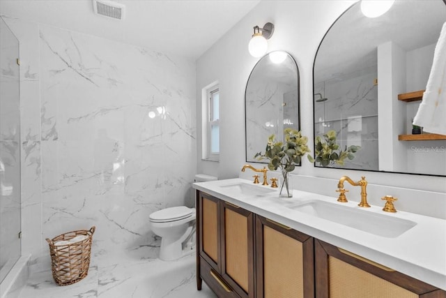 bathroom featuring tile walls, walk in shower, vanity, and toilet