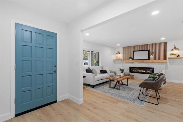 entryway with light hardwood / wood-style flooring