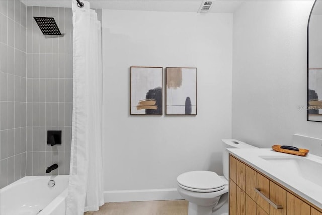 full bathroom featuring toilet, vanity, and shower / bath combo