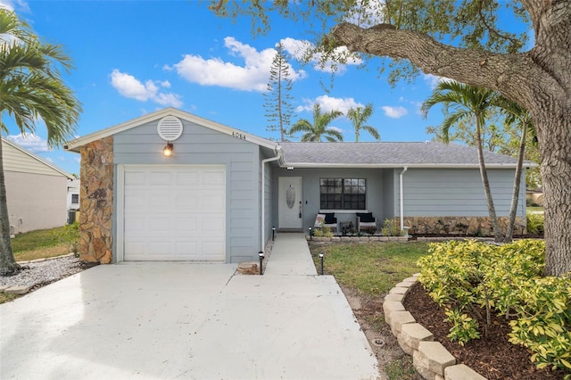 ranch-style home with a garage