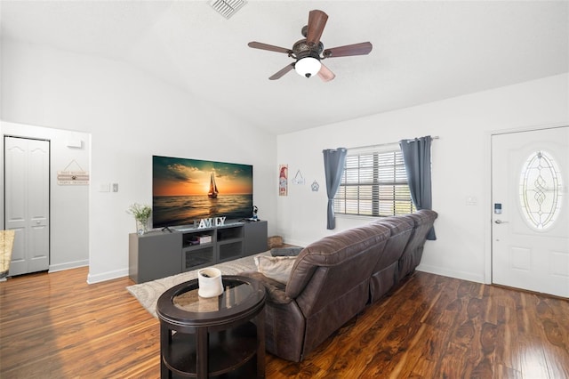 living room featuring lofted ceiling, dark hardwood / wood-style floors, and ceiling fan