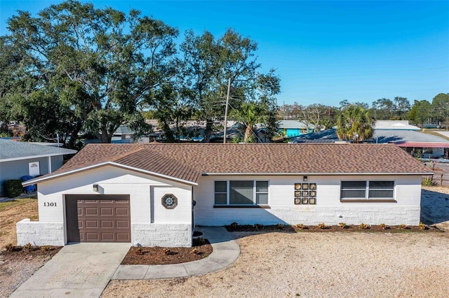 single story home with a garage