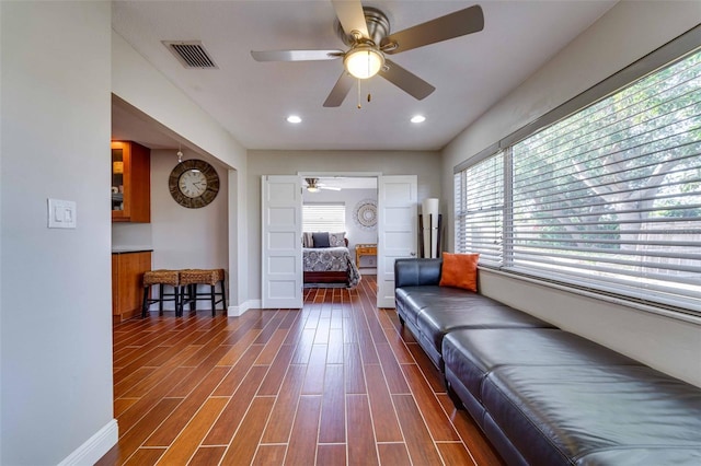 living room featuring ceiling fan