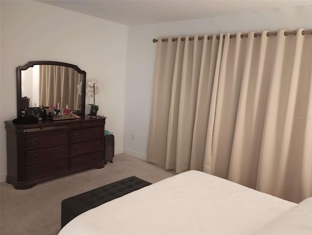 621 San Augusto Dr, Poinciana, FL 34759 - bedroom featuring radiator heating unit and light colored carpet