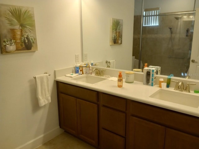 621 San Augusto Dr, Poinciana, FL 34759 - full bathroom with a stall shower, double vanity, and a sink