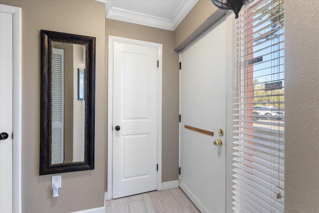 corridor with crown molding