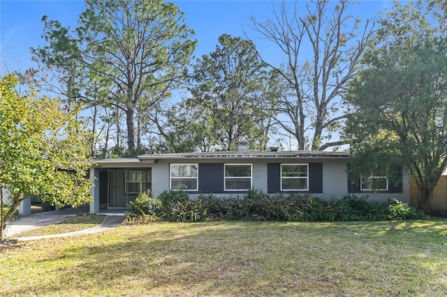 ranch-style house with a front yard