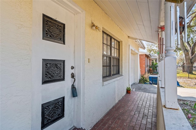 view of patio featuring a porch