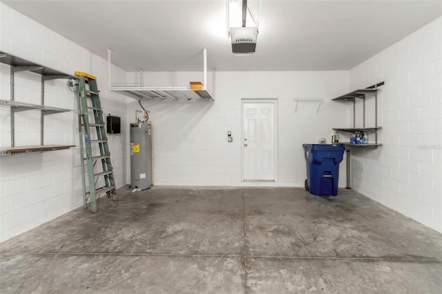 garage with water heater and a garage door opener