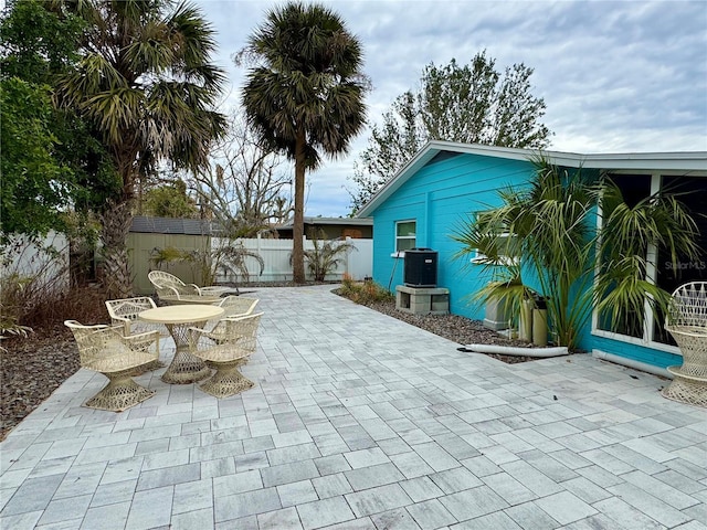 view of patio / terrace with a shed