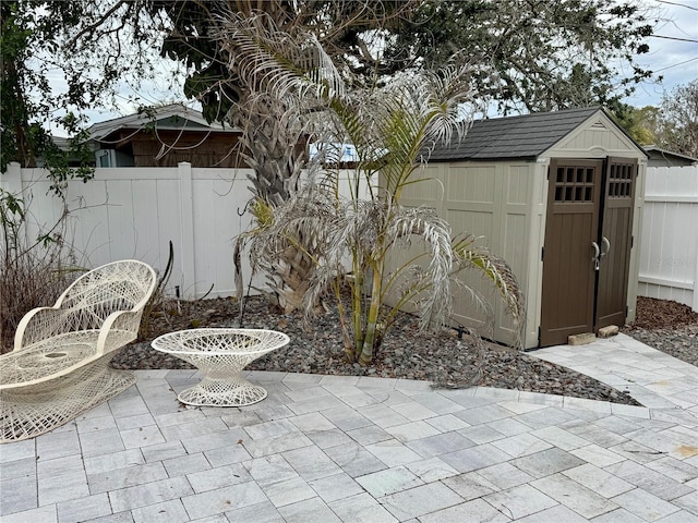 view of patio / terrace featuring a storage shed