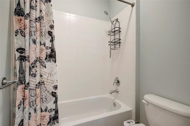 bathroom with toilet and shower / tub combo