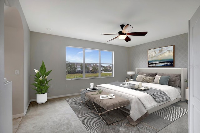 carpeted bedroom featuring ceiling fan