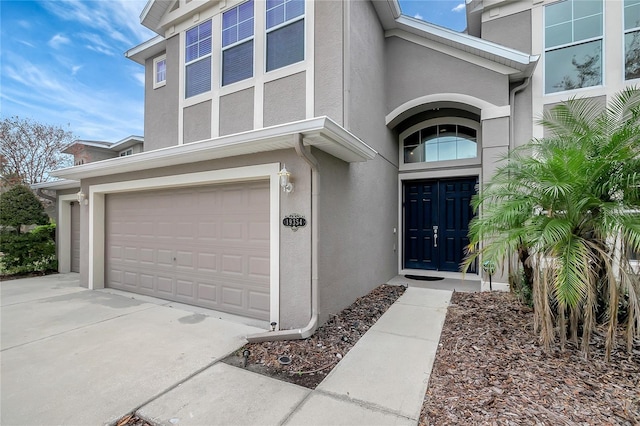 property entrance with a garage