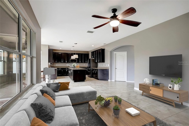 living room featuring ceiling fan