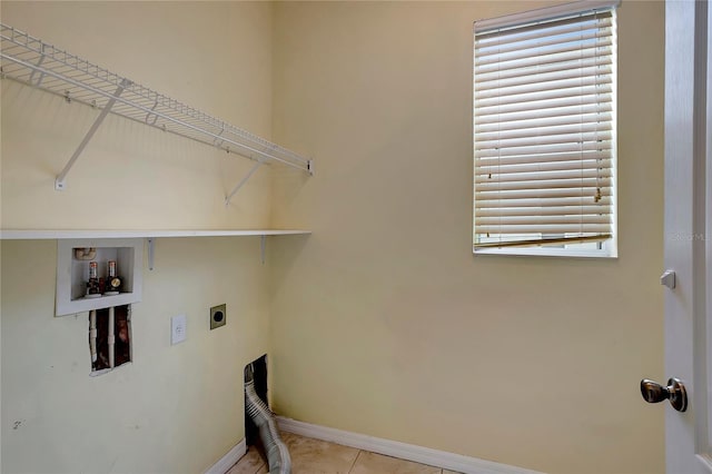 washroom with washer hookup, light tile patterned flooring, and electric dryer hookup