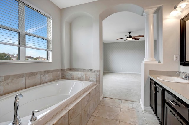 bathroom featuring ceiling fan, vanity, tile patterned floors, and ornate columns