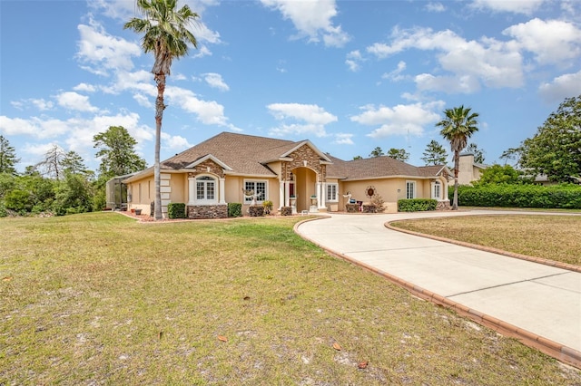 single story home with a front yard