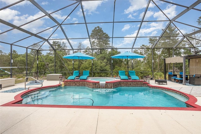 view of pool featuring a lanai, an in ground hot tub, and a patio