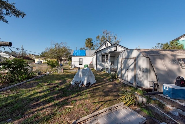 exterior space featuring an outbuilding and a yard