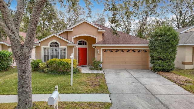 ranch-style house with a front lawn and a garage