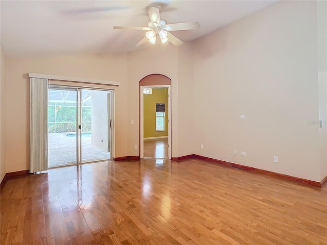 unfurnished room featuring light wood-type flooring and ceiling fan