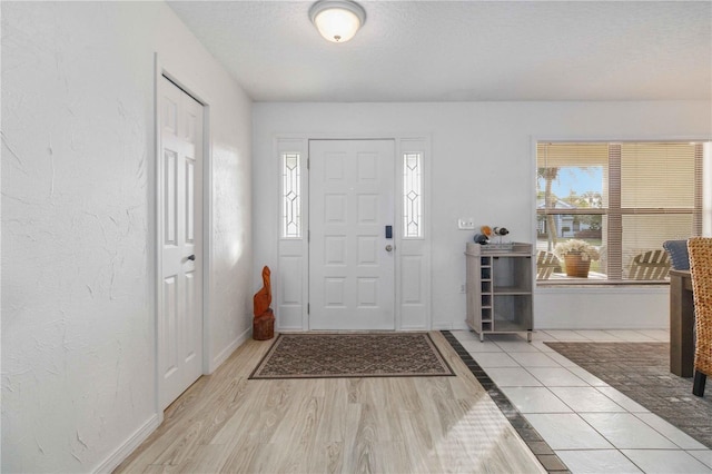 view of tiled foyer