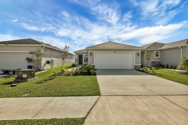 single story home featuring a front lawn and a garage