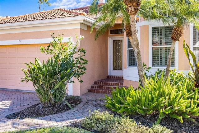 entrance to property with a garage