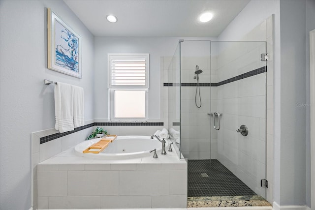 bathroom with independent shower and bath