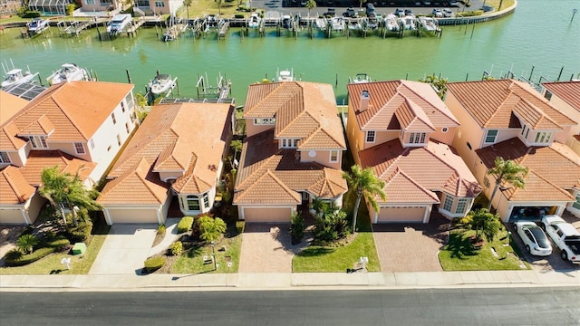 birds eye view of property featuring a water view