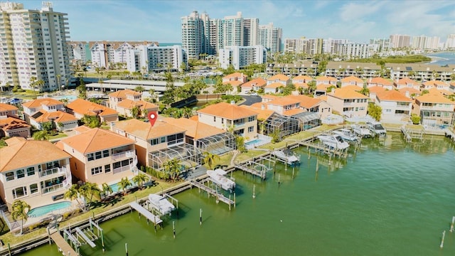 birds eye view of property featuring a water view