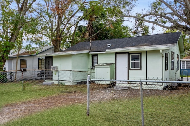 view of front of home with a front lawn