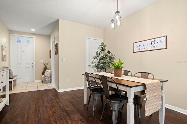 dining area featuring hardwood / wood-style flooring