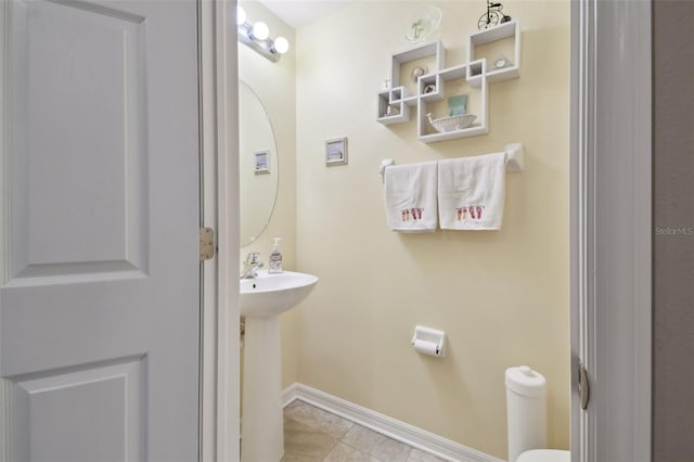 bathroom with sink and tile patterned floors